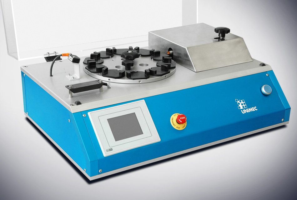 Machine de remontage de montres UNIMEC avec plateau rotatif
